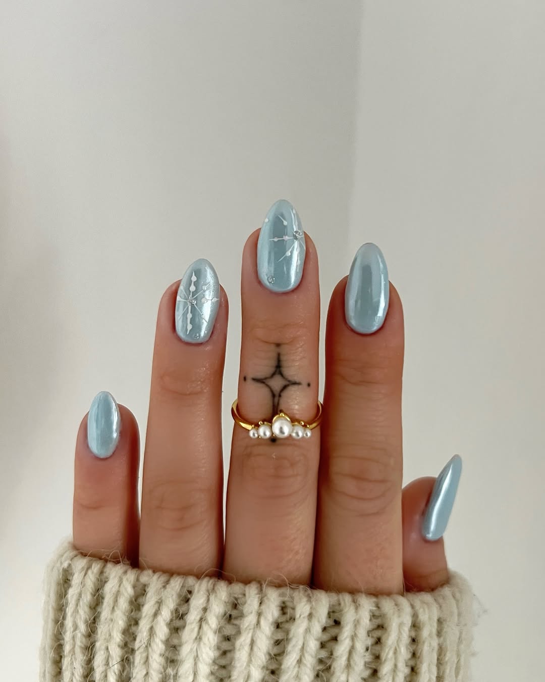 Icy Blue Snowflake Nails