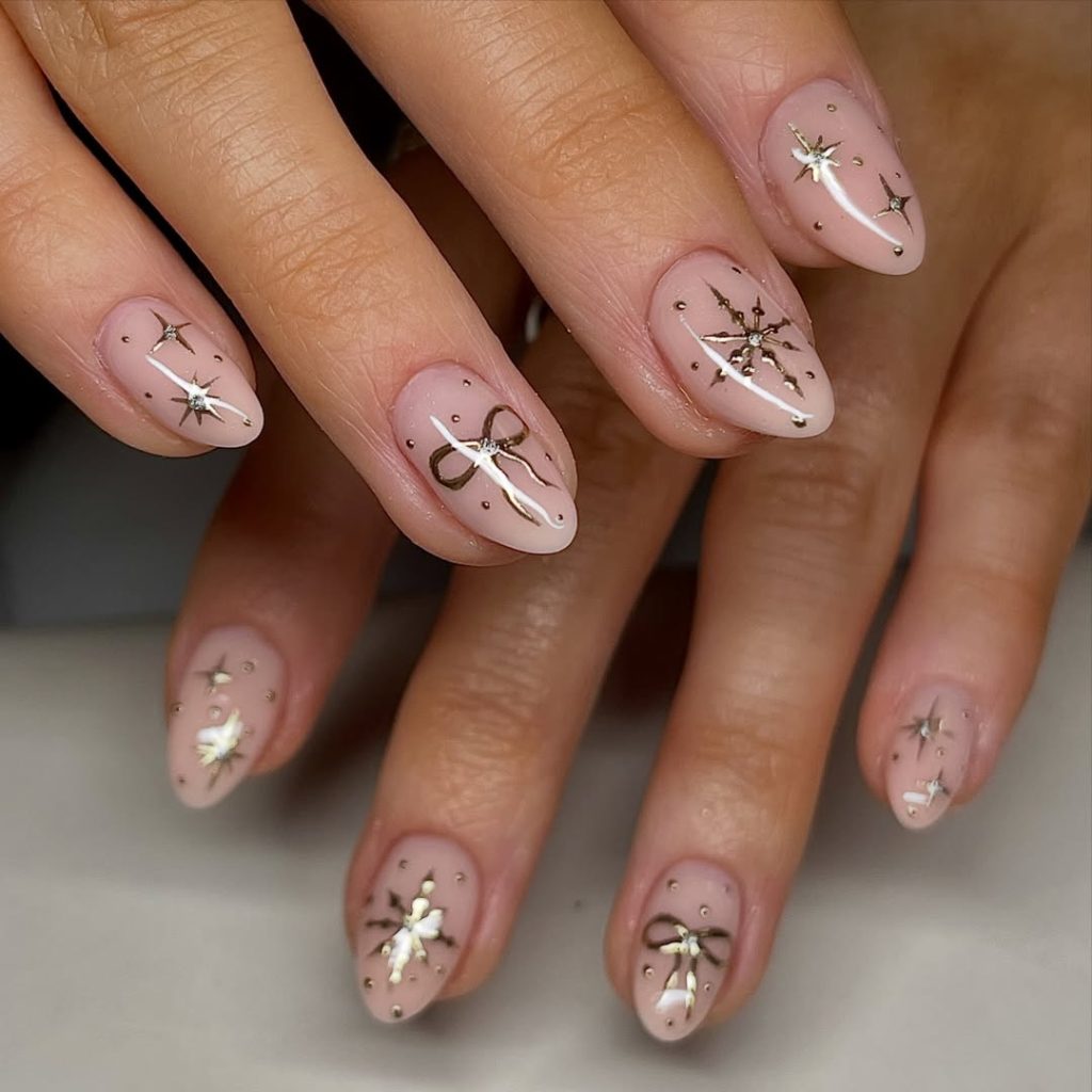 Pink Champagne Gold Bow Nails